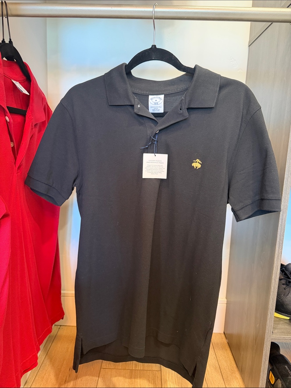 Brooks Brothers Black Polo with Gold Crest Embroidery
